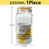 A clear glass mason jar with a yellow silicone lid and metal clamp, used for storage.