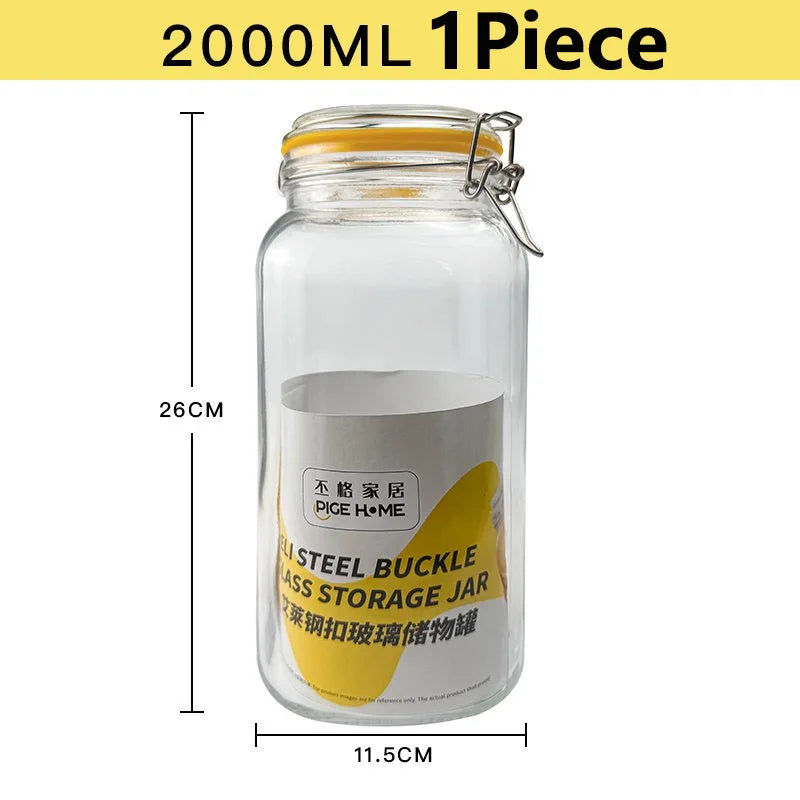 A clear glass mason jar with a yellow silicone lid and metal clamp, used for storage.
