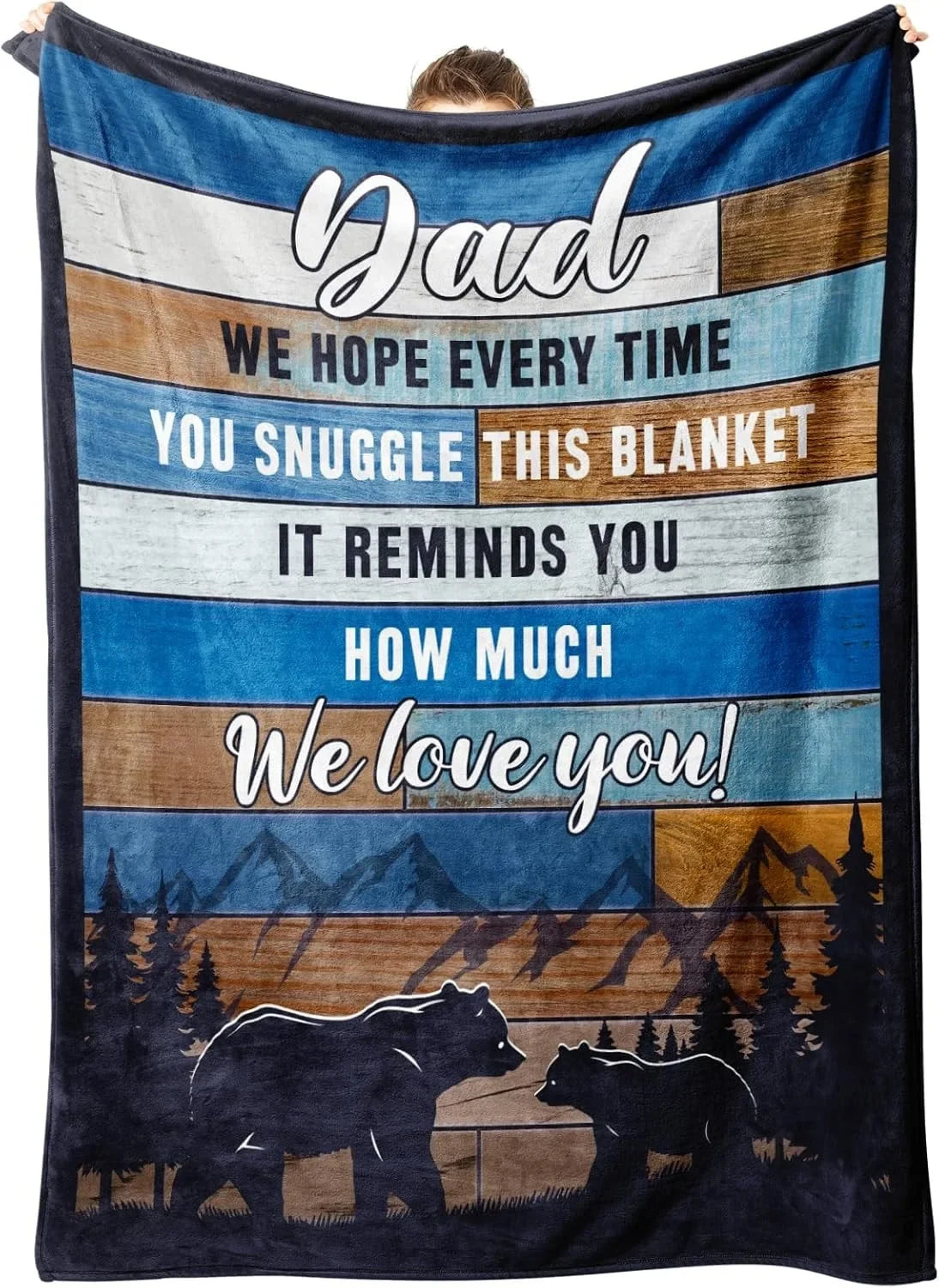 A dark blue fleece blanket featuring text that says Dad we hope every time you snuggle this blanket it reminds you how much w