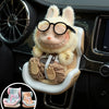 A plush rabbit accessory designed to fit into a car seat, featuring soft fur and storage clips.