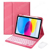A pink iPad keyboard case with a built-in keyboard and pencil holder is shown next to a white wireless mouse.