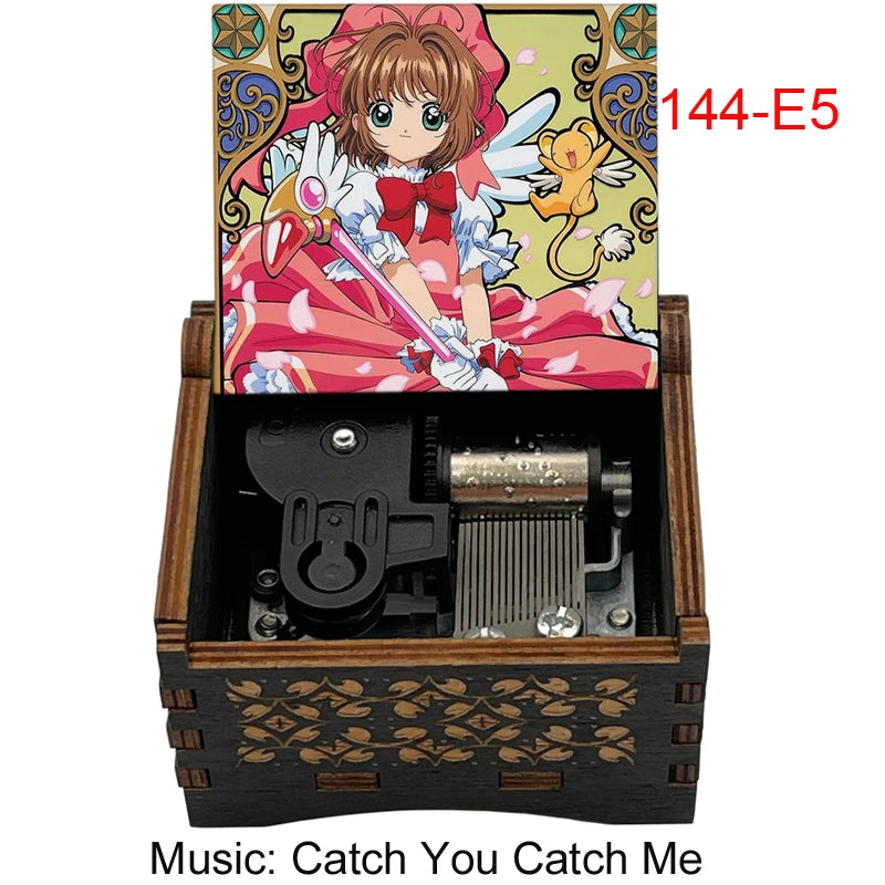 A wooden music box featuring a Cardcaptor Sakura character, with the title Catch You Catch Me visible.