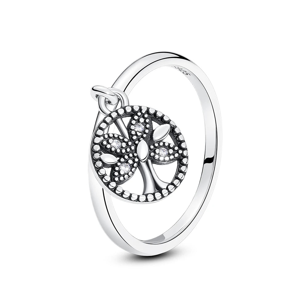 Sterling silver heart ring featuring a detailed tree design encrusted with cubic zirconia stones.