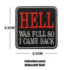 Black embroidered patch with red text reading HELL WAS FULL SO I CAME BACK