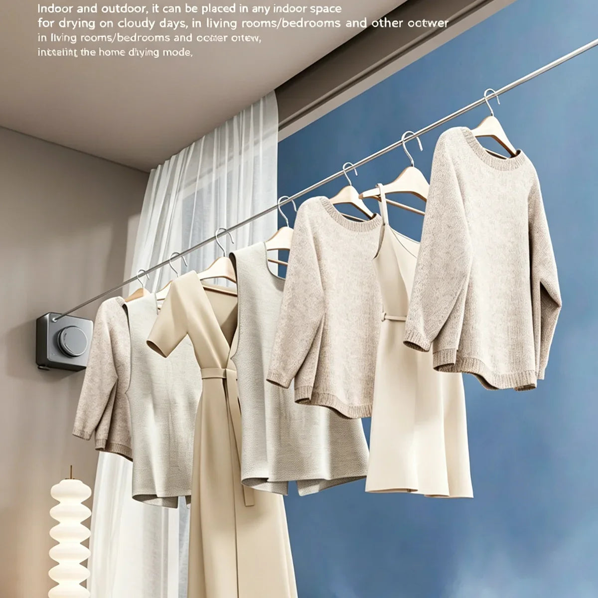 A retractable clothesline with a stainless steel cable is shown hanging several light-colored sweaters and shirts in a room.