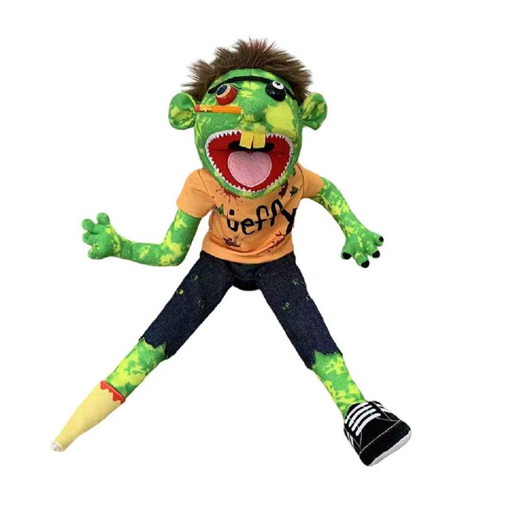 A plush toy of the character Jeffy featuring green skin, large teeth, and an orange shirt.