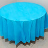 A vibrant light blue disposable round tablecloth spread over a table.