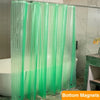 Green mesh shower curtain liner with magnets displayed in a bathroom setting.