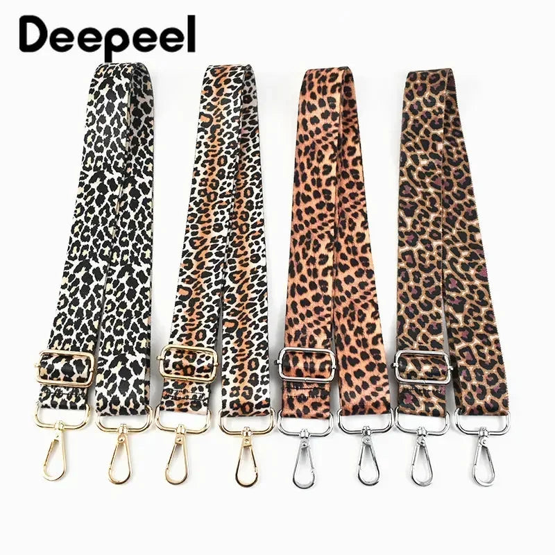 A set of leopard print wide adjustable crossbody bag straps.