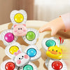 A set of colorful spinning bath toys for toddlers including plastic animals like a pig, duck, and other shapes.