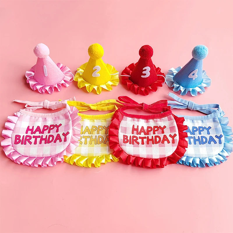 A set of four colorful birthday party hats and bibs for pets, featuring numbers 1 through 4 in pink, yellow, red, and blue.