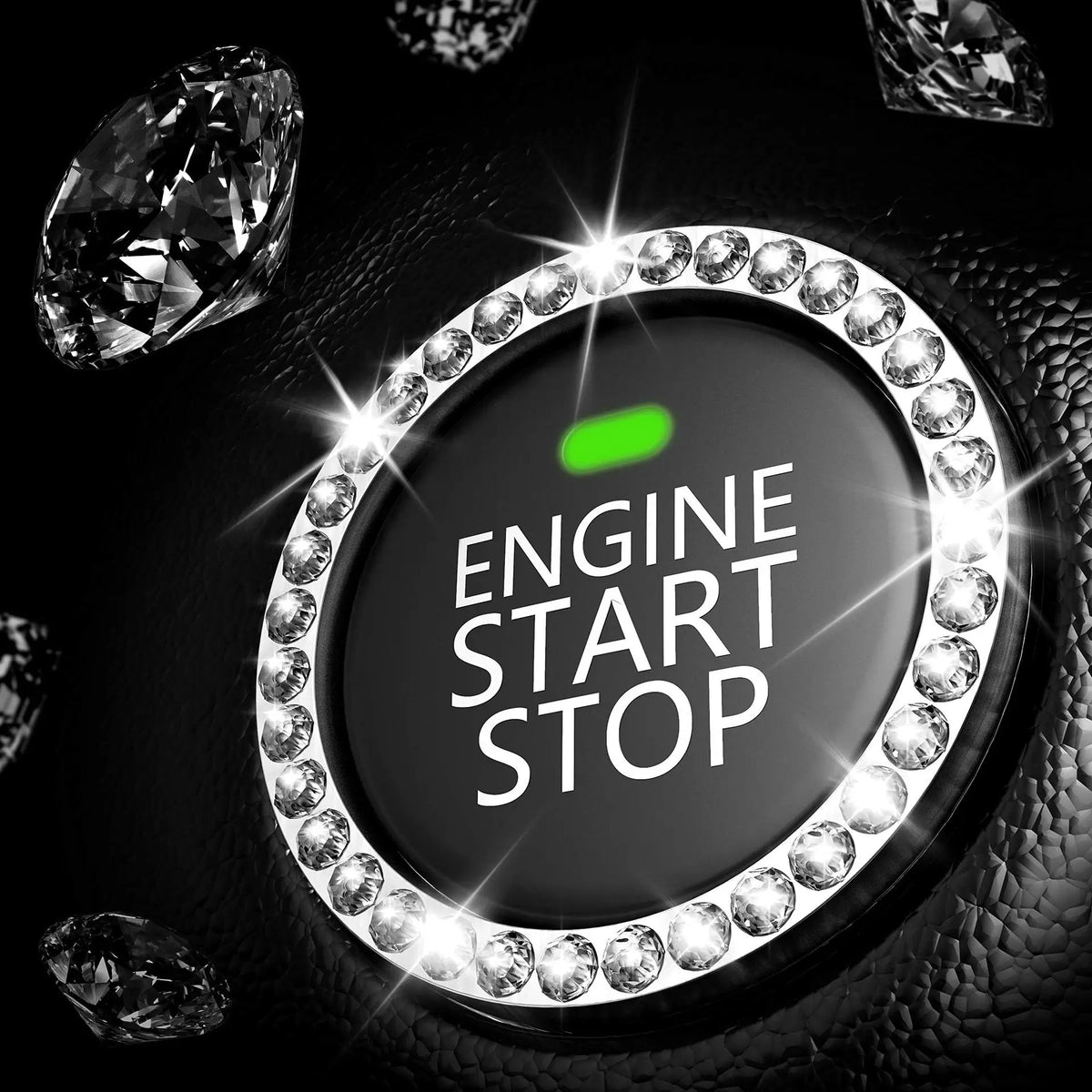 A close-up of a round button covered in clear rhinestones with a green indicator light, set against a dark leather background