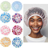 A collection of reusable polka dot waterproof shower caps in various colors and patterns shown alongside a model wearing a pi
