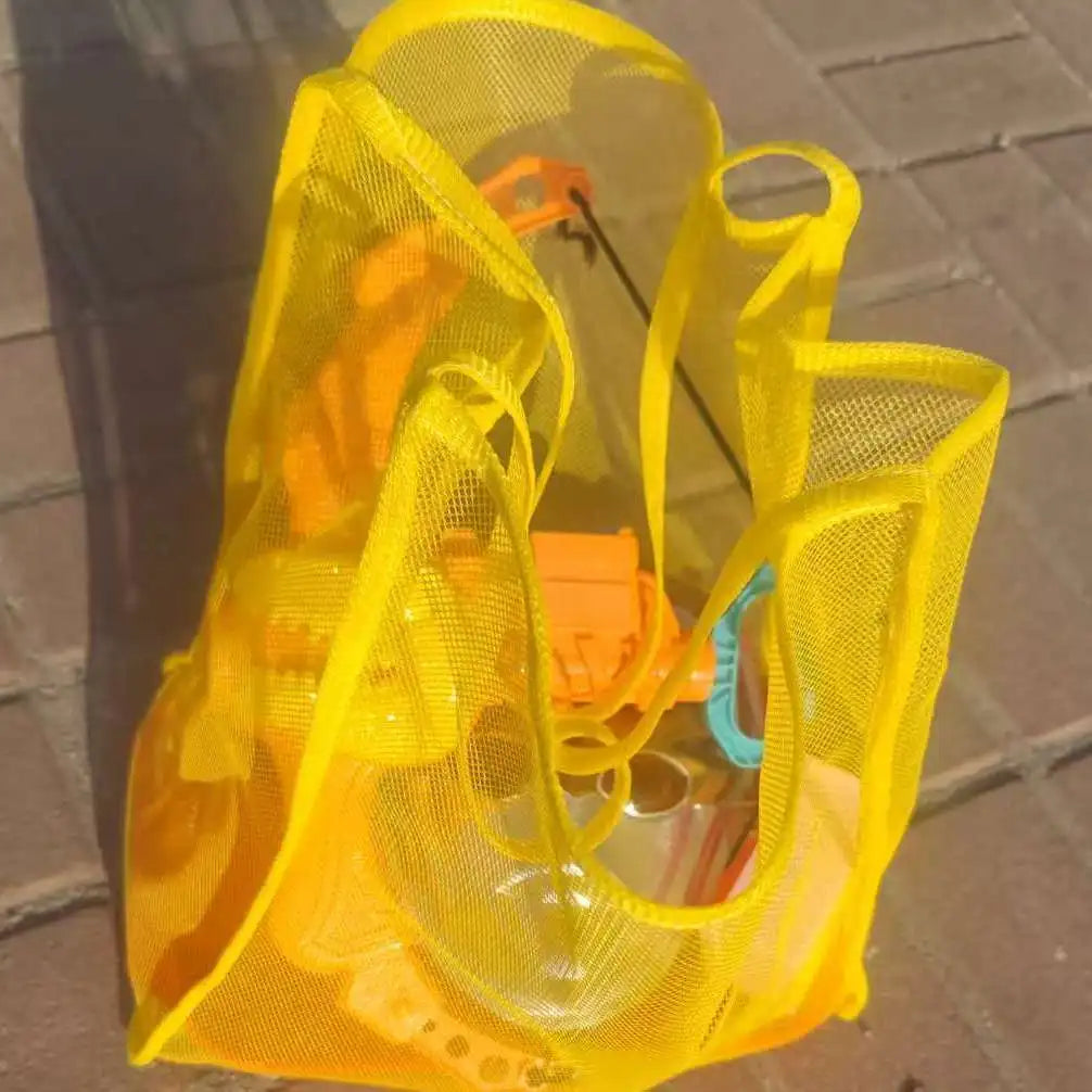 A bright yellow breathable mesh tote bag with an orange interior is shown in a daylight setting.