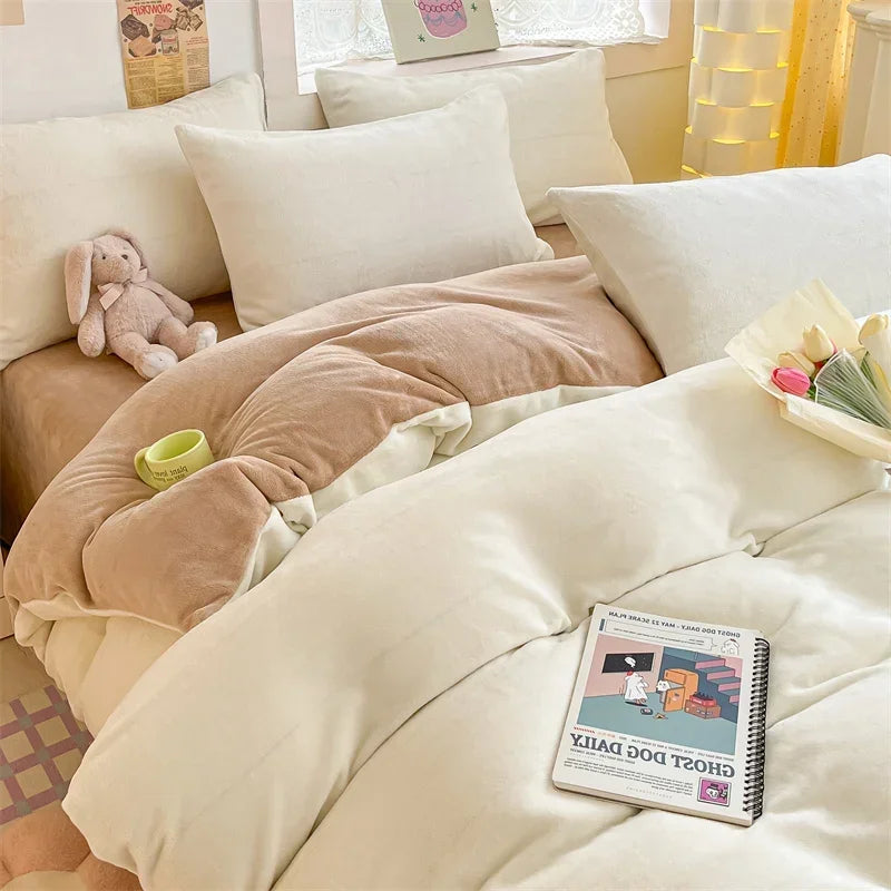 A cozy milk velvet bedding set featuring a duvet cover, pillowcases, and a stuffed rabbit toy.