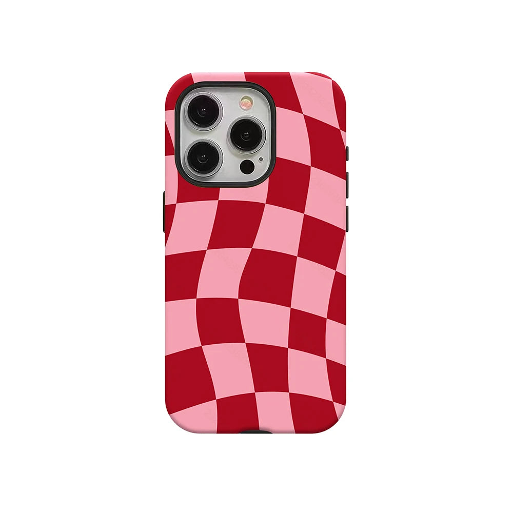 A red and pink checkered pattern phone case for an iPhone.