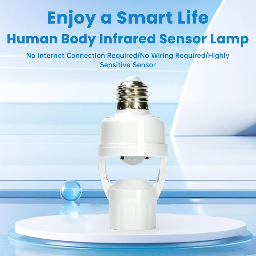 A white human body infrared sensor lamp holder with an E27 bulb displayed on a clear platform.