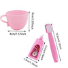 A pink doll outfit set including a jumpsuit, hat, and socks with measuring tools.