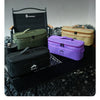 A collection of portable storage bags in olive green, beige, and purple are displayed on a dark surface.