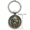Silver key chain featuring a medallion of Saint Michael the Archangel with wings and a sword.