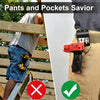 A close-up of a red clip-on tool belt holster attached to a tan fabric belt, demonstrating a pants and pockets savior tool.