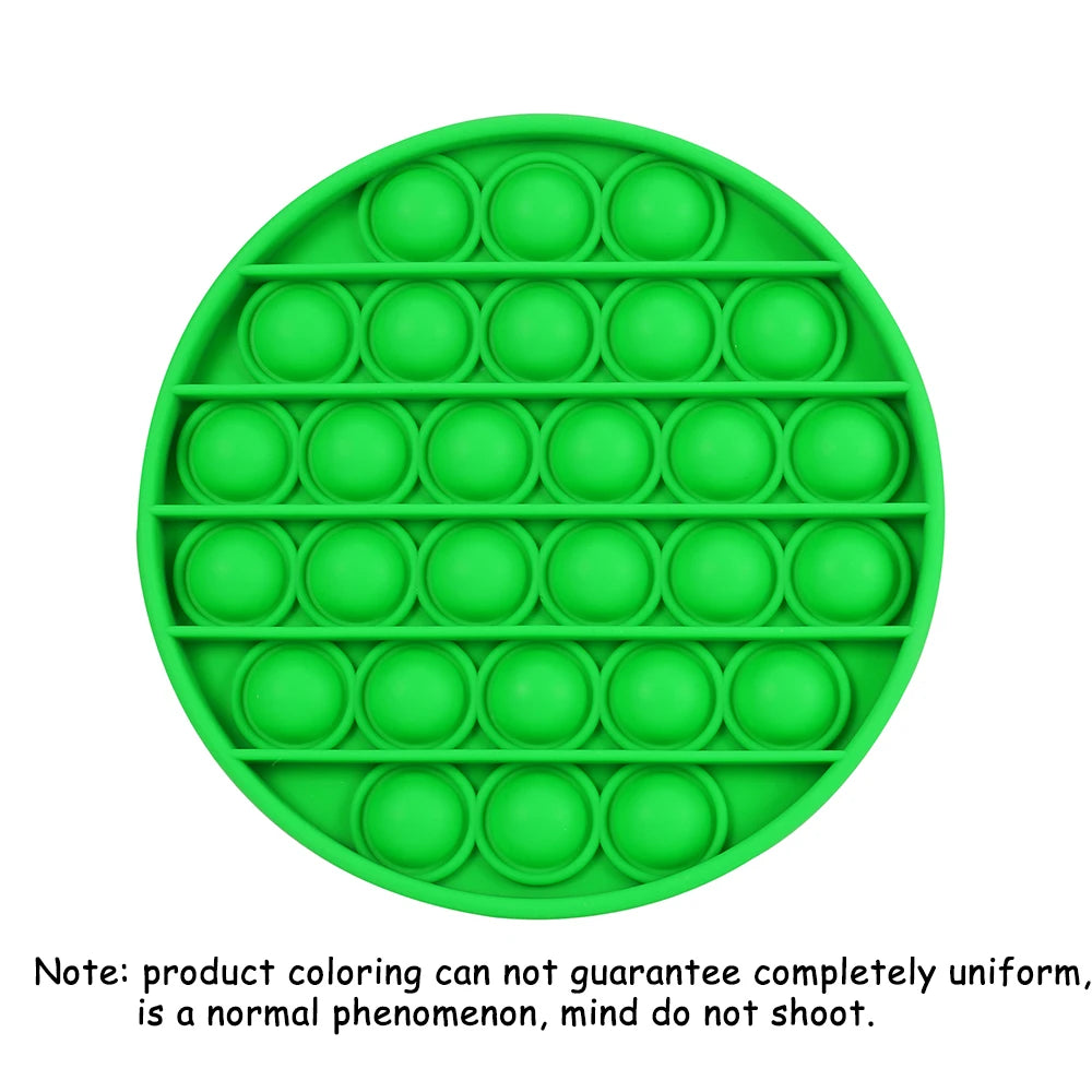 A green Pop-It fidget board with 30 circular bubbles arranged in a grid pattern.