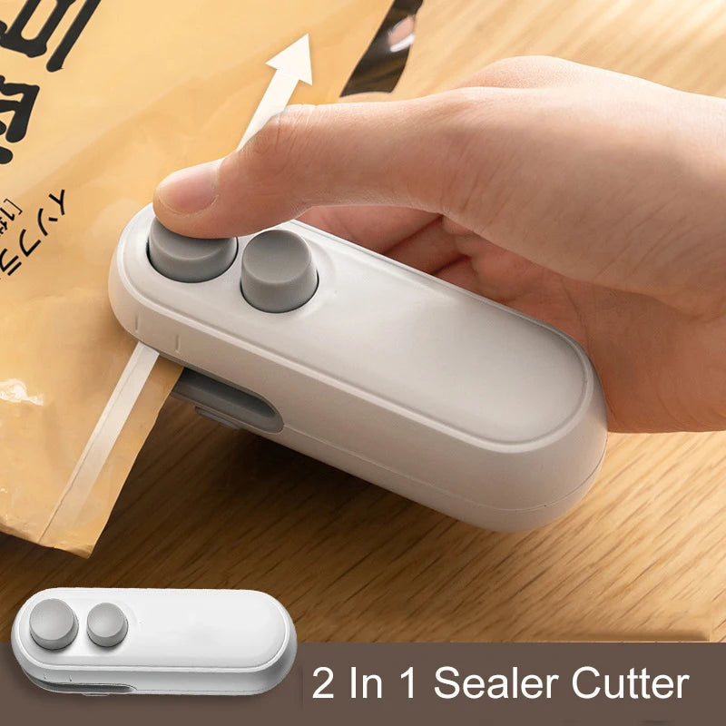 A hand holds a white 2 in 1 sealer cutter device next to a piece of paper on a wooden surface.