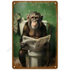 A portrait of a male orangutan holding a newspaper in a toilet bowl setting.