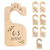 Set of wooden baby closet dividers with cartoon labels for 0-3 months and 3-12 months.