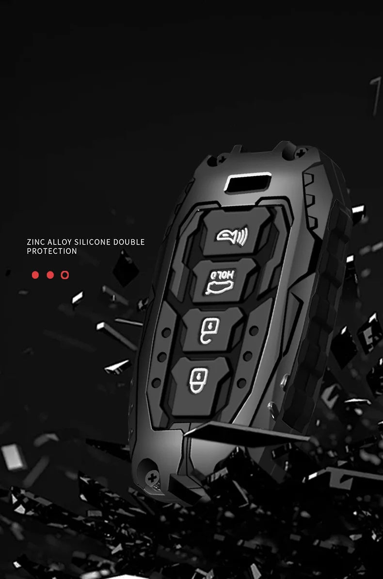 A black protective key fob cover made of zinc alloy silicone is shown against a dark background.