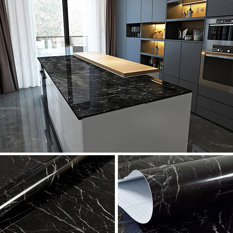 Roll of black marble wallpaper featuring white veining for kitchen and bathroom decor