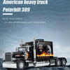 A detailed 1:24 scale diecast model of an American heavy truck, Peterbilt 389 alloy truck, featuring pull-back action and sim