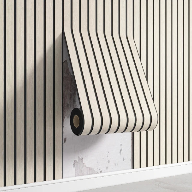 Roll of beige and white striped self-adhesive wall panels mounted on a light gray wall.