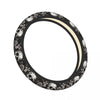 Black and white skull design anti-slip steering wheel cover with a beige trim ring.