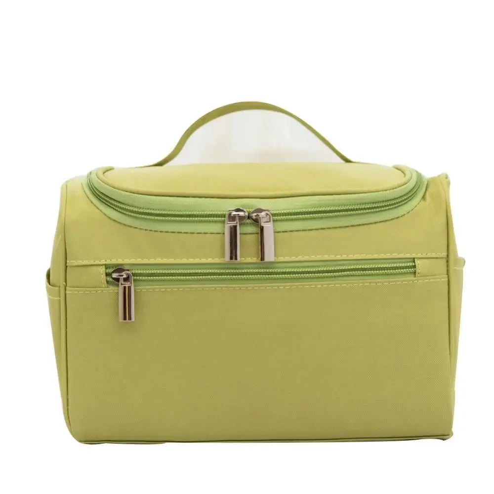 A lime green waterproof hanging makeup bag with a clear top and zippered compartments.