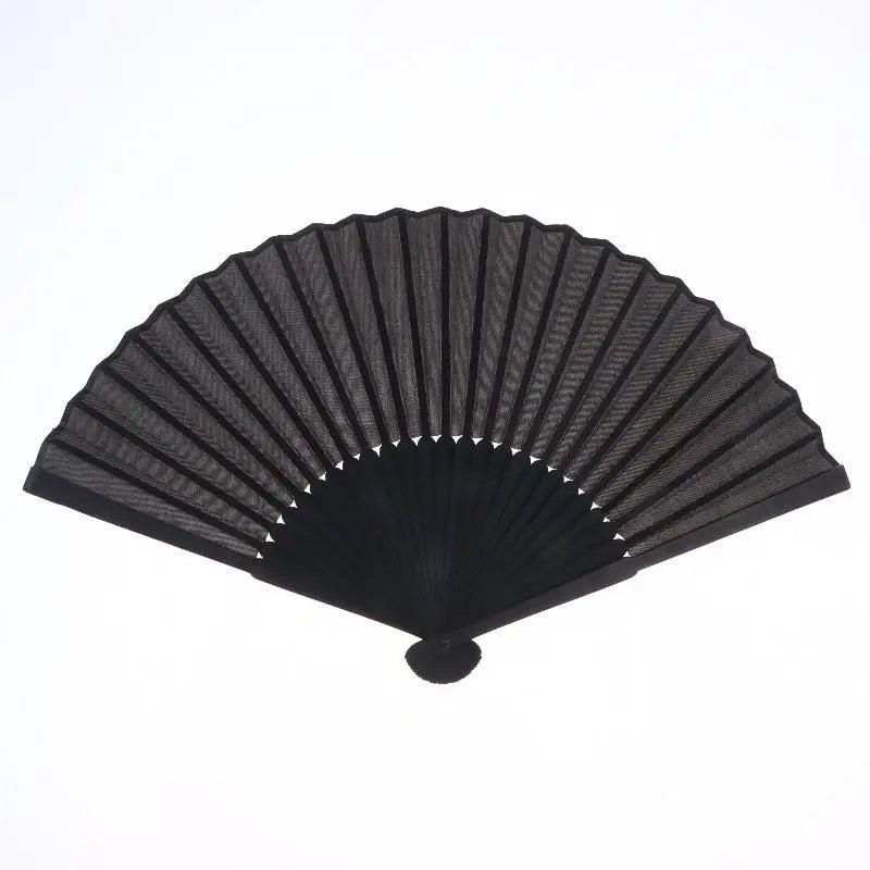 Black bamboo and silk folding fan with a pleated design.