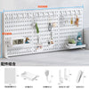 White desktop pegboard organizer featuring multiple hooks, shelves, and storage compartments for accessories