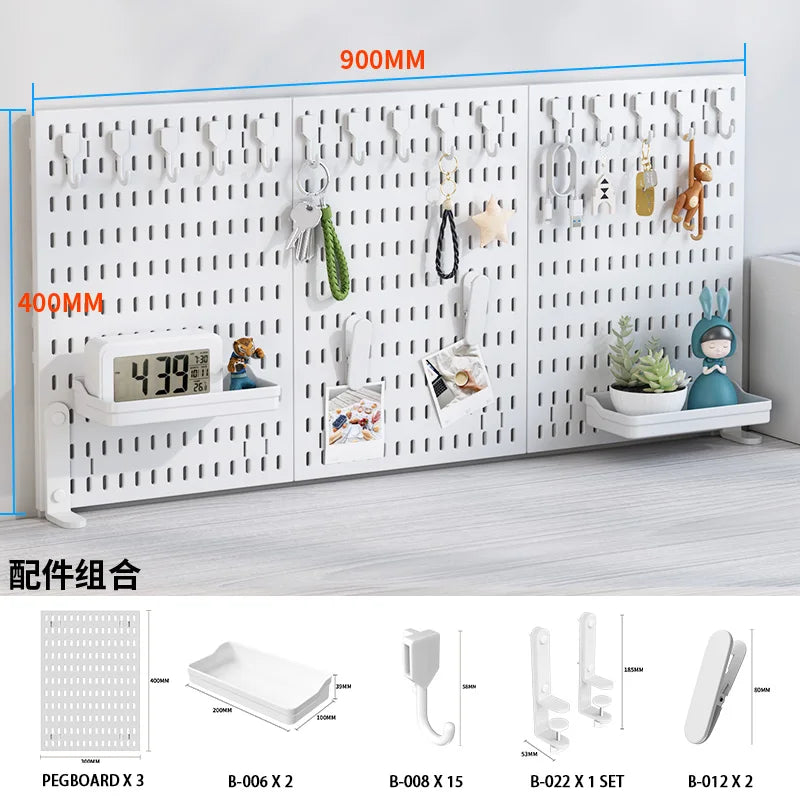 White desktop pegboard organizer featuring multiple hooks, shelves, and storage compartments for accessories