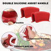 Red silicone assist handle covers for pans showing flexible design and concave pan ears
