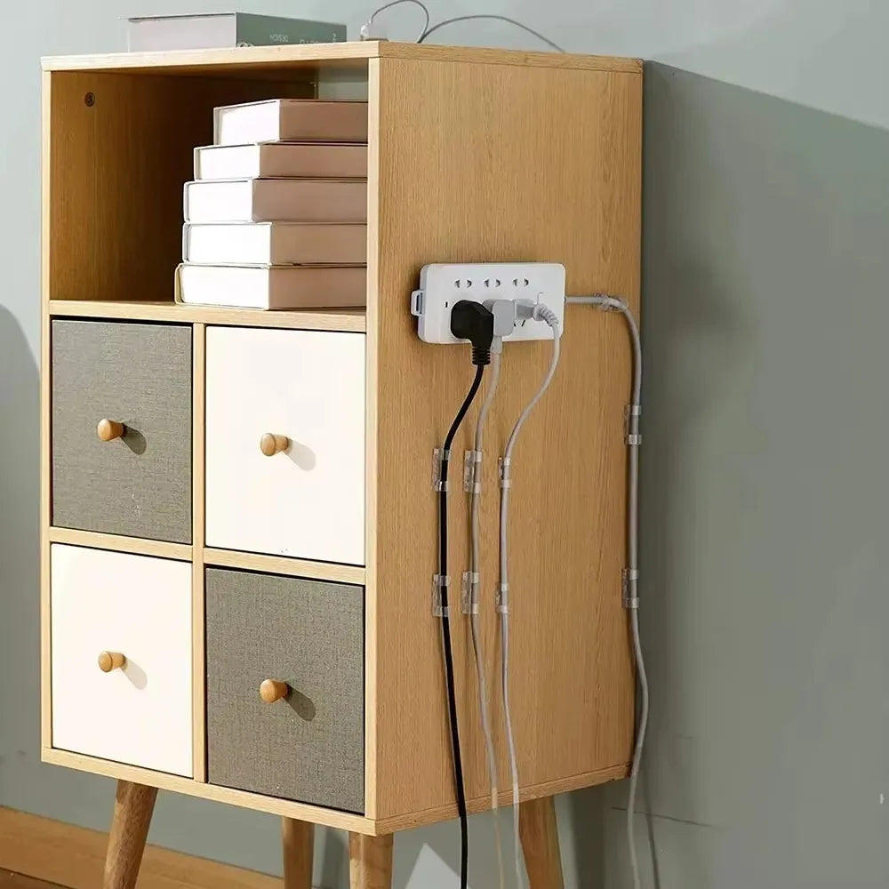 A wooden desktop organizer with compartments for storing and managing cables and accessories.