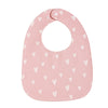 A pink baby bib with a U-shaped design featuring a pattern of white hearts on a soft fabric.