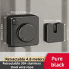 A black retractable clothesline with a handle and hidden storage mechanism mounted on a wall.