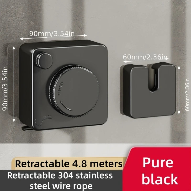 A black retractable clothesline with a handle and hidden storage mechanism mounted on a wall.