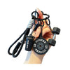 A hand holds a black fitness keychain featuring a weight plate and attached to a cord.