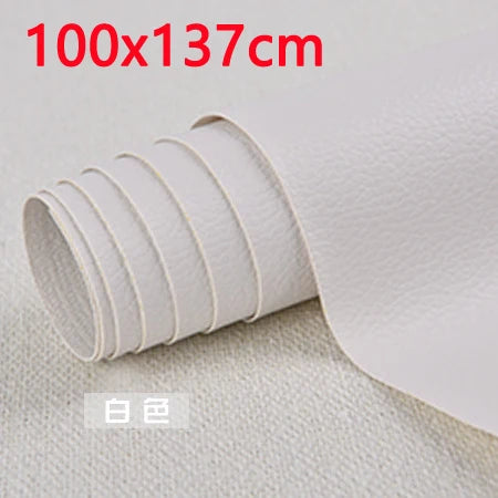 A roll of white self-adhesive PU leather patch measuring 100x137cm shown on a light fabric background.
