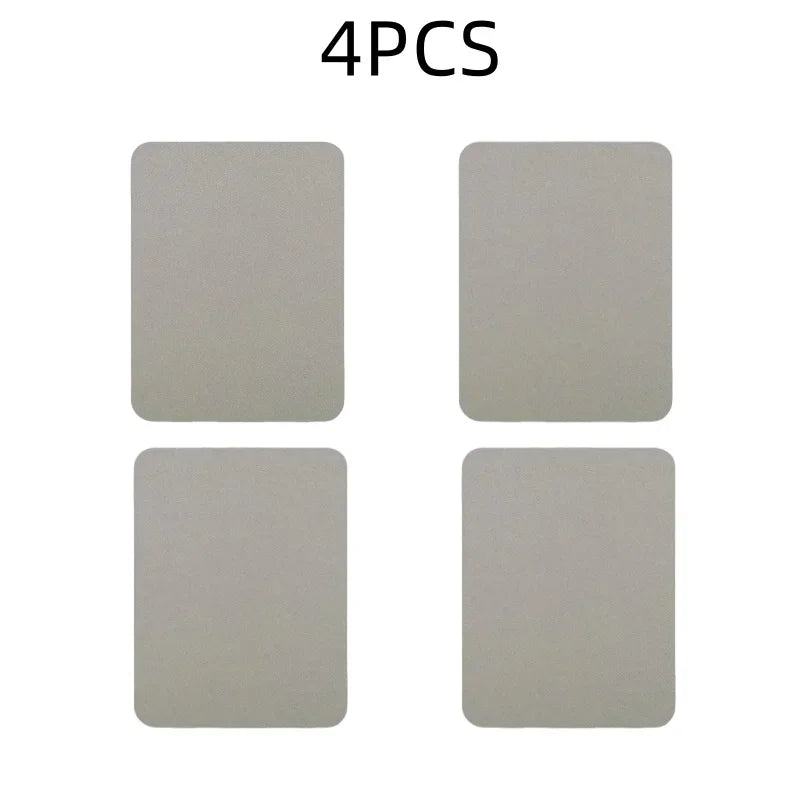 Four square gray iron-on fabric patches for clothing repair or DIY decor