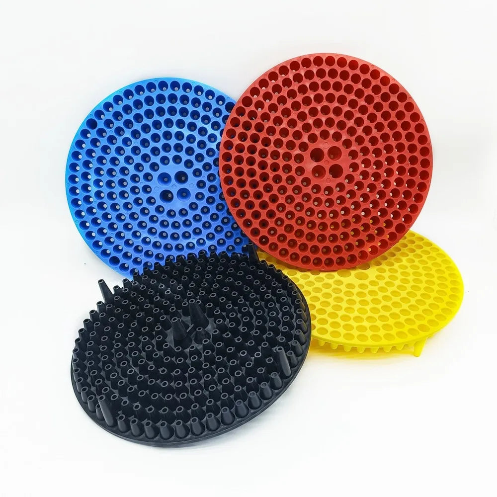 Three colored grit guard inserts for car wash buckets: blue, red, and yellow.