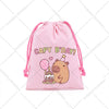 Pink drawstring storage bag featuring a cute capybara illustration and birthday text