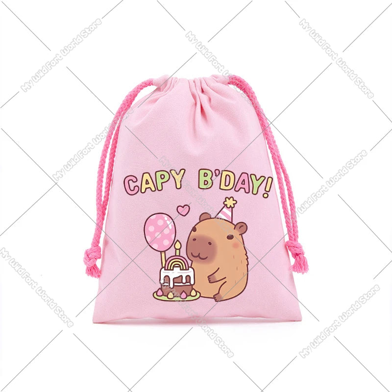Pink drawstring storage bag featuring a cute capybara illustration and birthday text