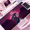 A vibrant anime character illustration on a pink mouse pad featuring a purple-haired girl in dark clothing.